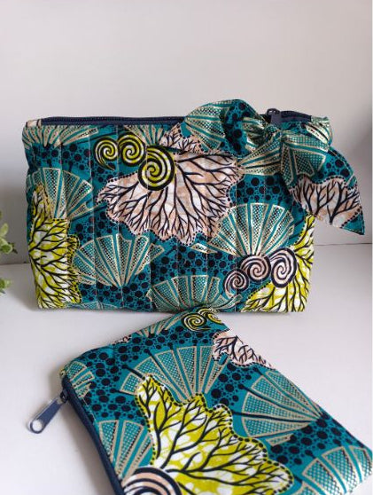 Trousse matelassée en wax et imperméable colorée